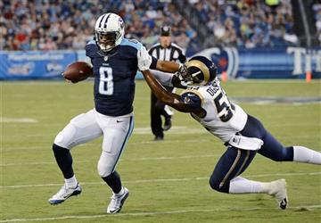 (AP Photo/Mark Zaleski). Tennessee Titans quarterback Marcus Mariota (8) is chased out of bounds by St. Louis Rams outside linebacker Alec Ogletree during the first half of a preseason NFL football game Sunday, Aug. 23, 2015, in Nashville, Tenn.