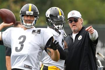 (AP Photo/Keith Srakocic). Pittsburgh Steelers new quarterback Michael Vick, center, talks with quarterbacks coach Randy Fichtner, right, as quarterback Landry Jones (3) passes during practice for the NFL football team, Wednesday, Aug. 26, 2015 in Pitt...