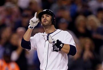 (AP Photo/Carlos Osorio). Detroit Tigers' J.D. Martinez looks skyward after his two-run home run off Los Angeles Angels starting pitcher Hector Santiago during the fifth inning of a baseball game Wednesday, Aug. 26, 2015, in Detroit.