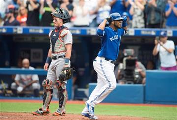 (Darren Calabrese/The Canadian Press via AP). Toronto Blue Jays' Edwin Encarnacion, right, celebrates a three-run home run in front of Detroit Tigers' catcher James McCann during the first inning of a baseball game in Toronto on Saturday, Aug. 29, 2015...