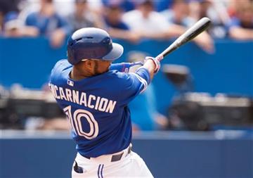 (Darren Calabrese/The Canadian Press via AP). Toronto Blue Jays' Edwin Encarnacion hits a two-run home run during the sixth inning of a baseball game against the Detroit Tigers, Saturday, Aug. 29, 2015 in Toronto  MANDATORY CREDIT