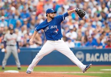 (Darren Calabrese/The Canadian Press via AP). Toronto Blue Jays' starting pitcher Drew Hutchison works against the Detroit Tigers during first inning of a baseball game in Toronto on Saturday, Aug. 29, 2015.  MANDATORY CREDIT