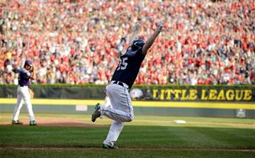 (AP Photo/Matt Slocum). Lewisberry, Pa.'s Chayton Krauss, right, celebrates after hitting the game-winner off Pearland, Texas' Marco Gutierrez during the sixth inning of the United States Championship baseball game at the Little League World Series tou...