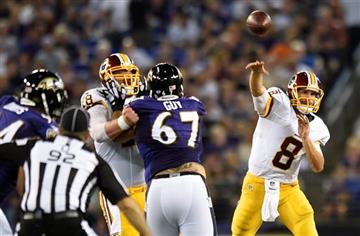 (AP Photo/Gail Burton). Washington Redskins quarterback Kirk Cousins (8) throws to a receiver as he is pressured in the first half of a preseason NFL football game against the Baltimore Ravens, Saturday, Aug. 29, 2015, in Baltimore.