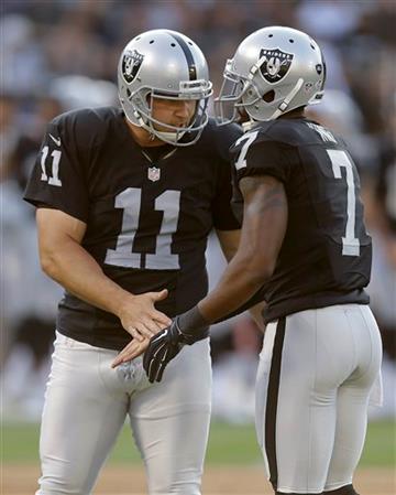 (AP Photo/Ben Margot). Oakland Raiders place kicker Sebastian Janikowski (11) celebrates with Marquette King after kicking a field goal during the first half of an NFL preseason football game against the Arizona Cardinals, Sunday, Aug. 30, 2015, in Oak...