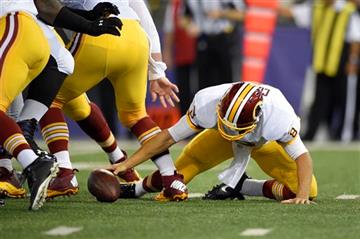 (AP Photo/Nick Wass). Washington Redskins quarterback Kirk Cousins chases after a fumble in the first half of a preseason NFL football game against the Baltimore Ravens, Saturday, Aug. 29, 2015, in Baltimore. Cousins recovered the ball on the play.