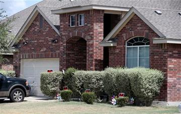 (John Davenport/The San Antonio Express-News via AP). No trespassing signs are visible at the house Tuesday, Sept. 1, 2015, where deputies fatally shot Gilbert Flores, in Northwest Bexar County, Texas, near San Antonio, last Friday. A Texas prosecutor ...