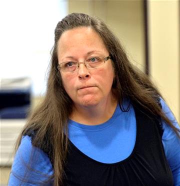 (AP Photo/Timothy D. Easley). Rowan County Clerk Kim Davis listens to a customer following her office's refusal to issue marriage licenses at the Rowan County Courthouse in Morehead, Ky., Tuesday, Sept. 1, 2015. Although her appeal to the U.S. Supreme ...
