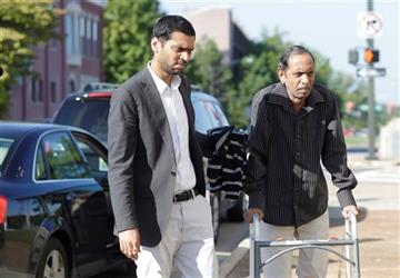 (AP Photo/Brynn Anderson). Chirag Patel helps his father, Sureshbhai Patel as they arrive outside the federal courthouse before start of a trial against Madison, Ala., police officer Eric Sloan Parker, Tuesday, Sept. 1, 2015, in Huntsville, Ala. Patel,...