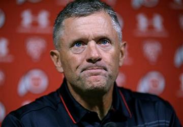 (AP Photo/Rick Bowmer). Utah NCAA college football coach Kyle Whittingham speaks during a news conference Monday, Aug. 31, 2015, in Salt Lake City. Jim Harbaugh and the Michigan Wolverines have been one of the biggest storylines headed into the 2015 co...