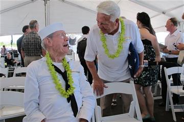 (AP Photo/Audrey McAvoy). World War II USS Missouri shipmates Ray Morse, left, of Huntington, W.Va. and Donald Fosburg of Whittier, Calif. catch up after a ceremony marking the 70th anniversary of the end of World War II, Wednesday, Sept. 2, 2015 in Pe...