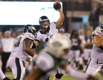 (AP Photo/Mel Evans). Philadelphia Eagles quarterback Tim Tebow (11) throws a pass for a touchdown during the first half of a preseason NFL football game Thursday, Sept. 3, 2015  in East Rutherford, N.J.