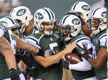 (AP Photo/Bill Kostroun). New York Jets quarterback Matt Flynn (5) celebrates with Chris Owusu (17) after they connected for a touchdown pass during the first half of a preseason NFL football game against the Philadelphia Eagles Thursday, Sept. 3, 2015...