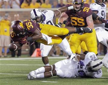 (AP Photo/Paul Battaglia). Minnesota running back Rodrick Williams Jr. (35) fumbles the ball  as he is tackled by TCU safety Derrick Kindred (26) during the first half of an NCAA college football game Thursday, Sept. 3, 2015, in Minneapolis. TCU recove...
