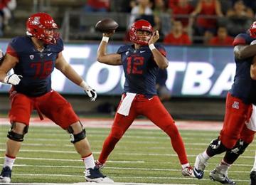 (AP Photo/Rick Scuteri). Arizona quarterback Anu Solomon throws down field against UTSA during the first half of an NCAA college football game, Thursday, Sept. 3, 2015, in Tucson, Ariz.