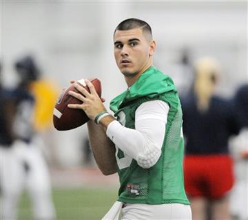(Bruce Newman/The Oxford Eagle via AP, File). FILE - In this Aug. 6, 2015, file photo, Mississippi quarterback Chad Kelly throws a pass during NCAA college football practice in Oxford, Miss. Ole Miss starts Chad Kelly, the nephew of Hall of Famer Jim K...