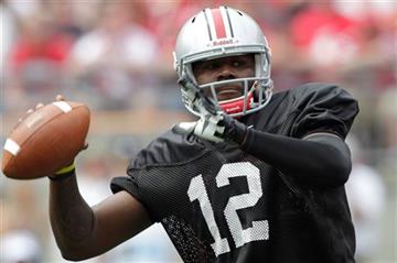 (AP Photo/Jay LaPrete, File). FILE - In this April 18, 2015, file photo, Ohio State quarterback Cardale Jones passes during Ohio State's NCAA college football Spring game in Columbus, Ohio. Urban Meyer will either start the Big Ten player of the year (...