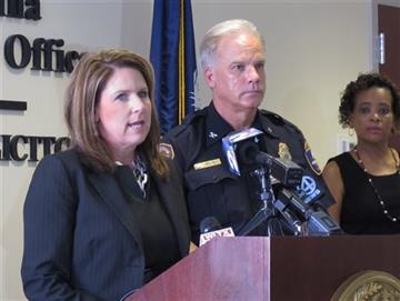 (AP Photo/Jeffrey Collins). Solicitor Scarlett Wilson, left, announces her intention to seek the death penalty against Dylann Roof in the killing of nine people at the Emmanuel African Methodist Episcopal Church as Charleston Police Chief Greg Mullen, ...