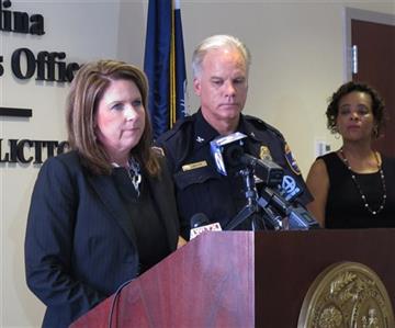 (AP Photo/Jeffrey Collins). Solicitor Scarlett Wilson, left, announces her intention to seek the death penalty against Dylann Roof in the killing of nine people at the Emmanuel African Methodist Episcopal Church as Charleston Police Chief Greg Mullen, ...