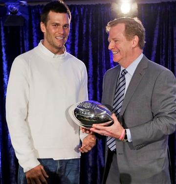 (AP Photo/David J. Phillip, File). FILE - In this Feb. 2, 2015, file photo, New England Patriots quarterback Tom Brady poses with NFL Commissioner Rodger Goodell during a news conference after NFL football's Super Bowl XLIX in Phoenix, Ariz. A federal ...