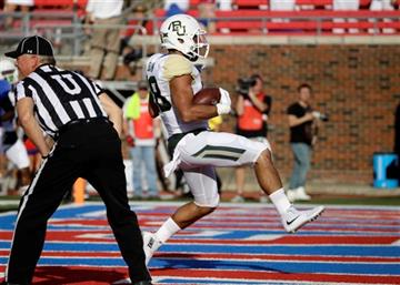 (AP Photo/LM Otero). Baylor running back Devin Chafin (28) scores a touchdown during the first half of an NCAA college football game against the SMU, Friday, Sept. 4, 2015, in Dallas.