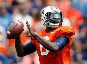 (AP Photo/Brynn Anderson, File). FILE - In this April 18, 2015, file photo, Auburn quarterback Jeremy Johnson (6) looks to pass during the first half of their spring NCAA college football game in Auburn, Ala. Auburn constructed a formidable ground game...