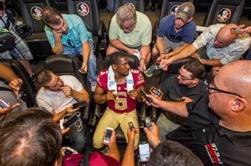 (AP Photo/Mark Wallheiser, File). FILE - In this Aug. 9, 2015, file photo, Florida State quarterback Everett Golson, center, talks during NCAA college football media day in Tallahassee, Fla. Everett Golson and Vernon Adams were the biggest names on the...