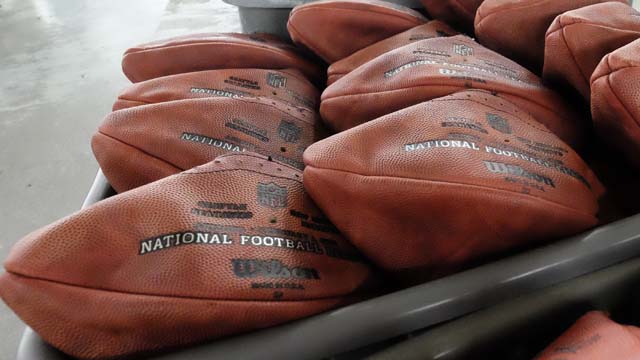 Official game balls for NFL football's Super Bowl XLIX. (AP Photo/Rick Osentoski)