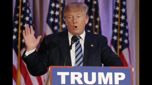 Republican presidential candidate Donald Trump speaks during a news conference at the Mar-A-Lago Club where former Republican presidential candidate Ben Carson announced he is endorsing Trump, Friday, March 11, 2016. (AP Photo/Lynne Sladky)