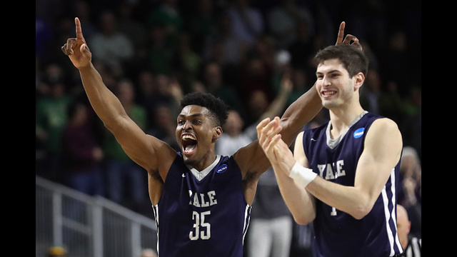 PROVIDENCE, RI - MARCH 17: Brandon Sherrod #35 of the Yale Bulldogs and Anthony Dallier #1 celebrate defeating the Baylor Bears 79-75 during the first round of the 2016 NCAA Men's Basketball Tournament at Dunkin' Donuts Center on March 17, 2016 in Providence, Rhode Island. (Photo by Maddie Meyer/Getty Images)
