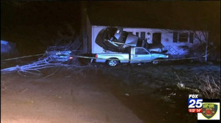 Car goes airborne, crashes into Ashland house