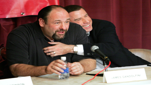 Actors James Gandolfini and John Travolta attend the 